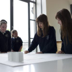 School children around a table